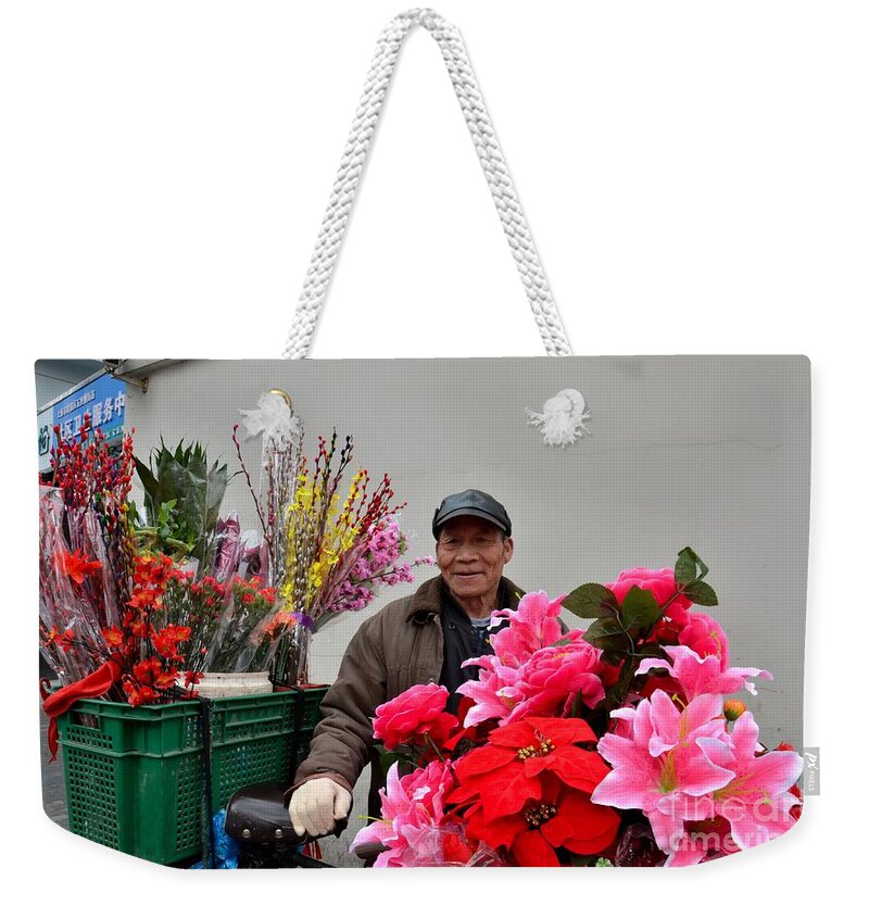 Flowers Weekender Tote Bag featuring the photograph Chinese bicycle flower vendor on street Shanghai China #2 by Imran Ahmed