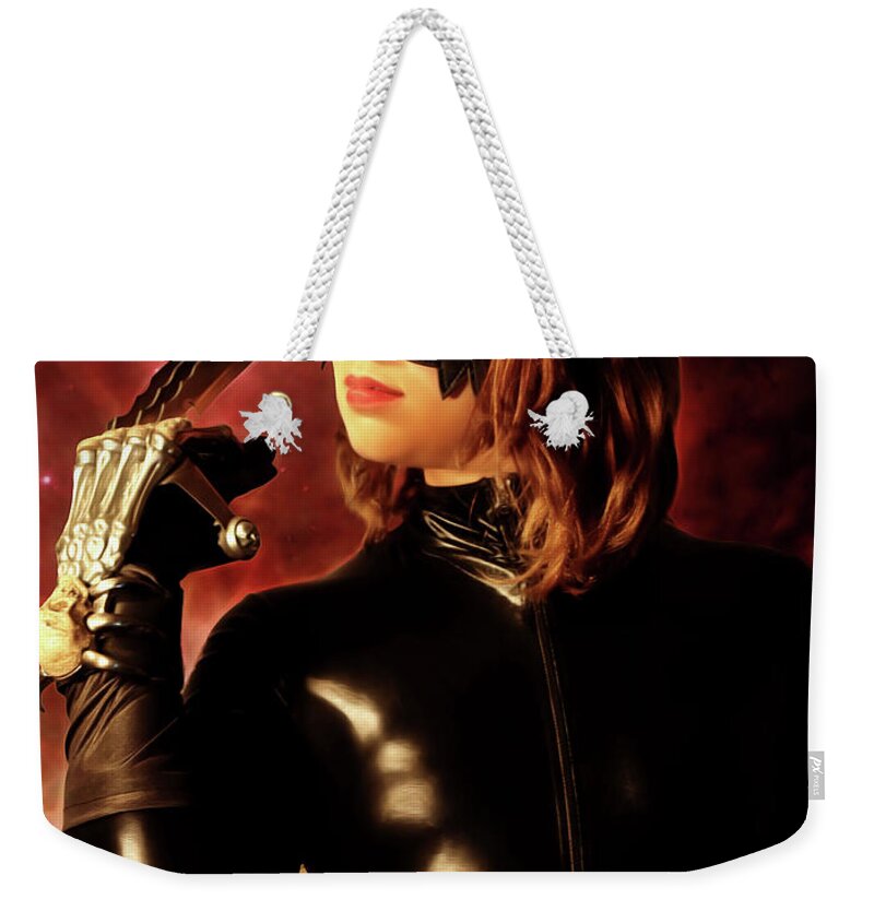 Cat Woman Weekender Tote Bag featuring the photograph Claw of the Killer Cat #1 by Jon Volden