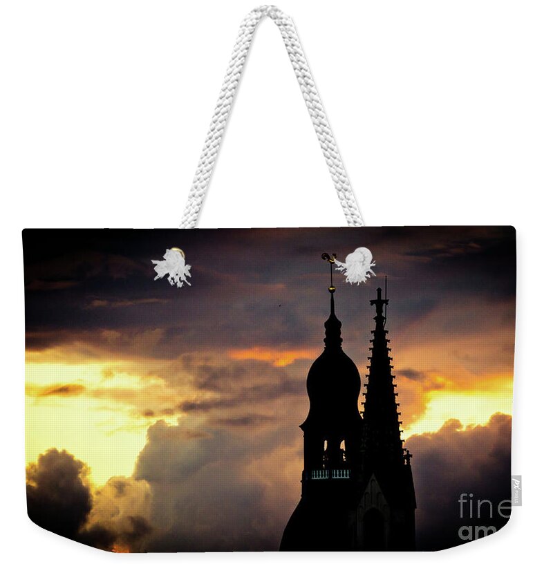 Cities Weekender Tote Bag featuring the photograph Cloudscape of orange sunset old town Riga Latvia #1 by Raimond Klavins