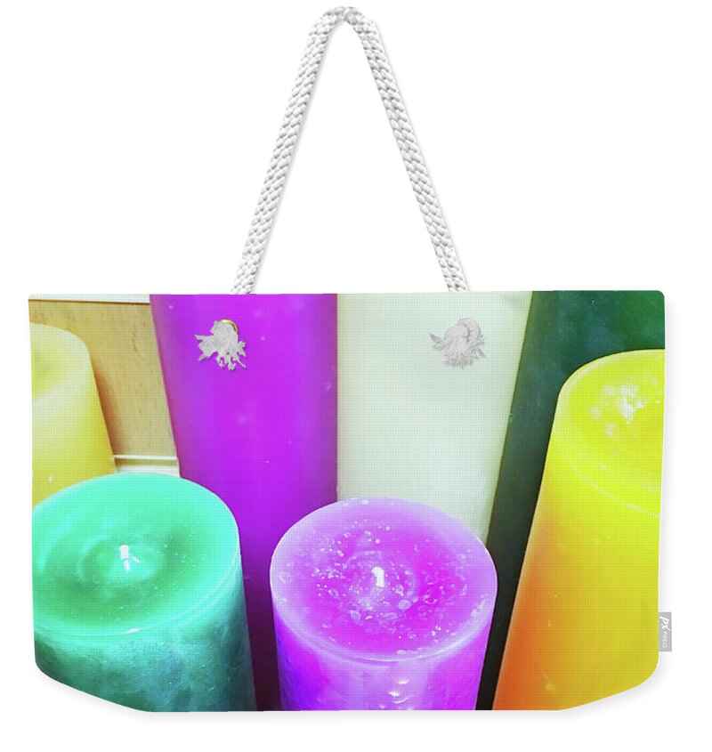 Anniversary Weekender Tote Bag featuring the photograph Colourful candles #1 by Tom Gowanlock