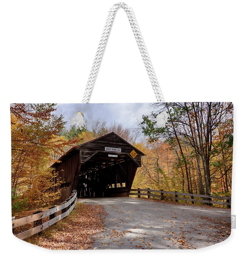 #jefffolger Weekender Tote Bag featuring the photograph Fall colors over the Durgin Covered Bridge #1 by Jeff Folger