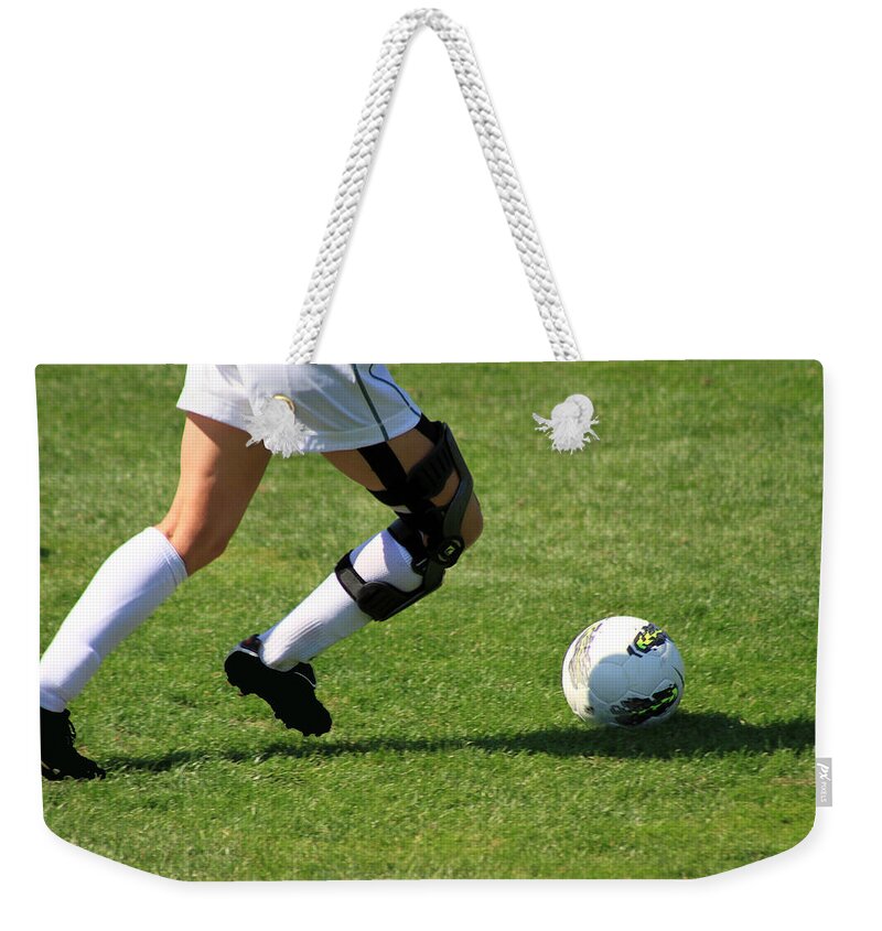 Ball Weekender Tote Bag featuring the photograph Futbol #1 by Laddie Halupa