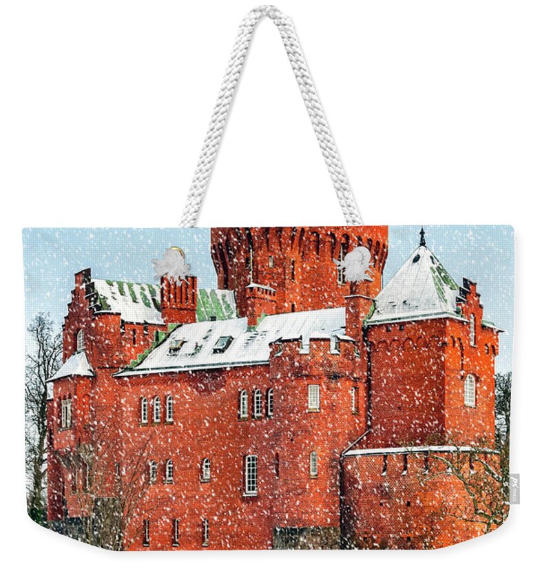 Hjularod Weekender Tote Bag featuring the photograph Hjularod Castle in the Snow #1 by Antony McAulay