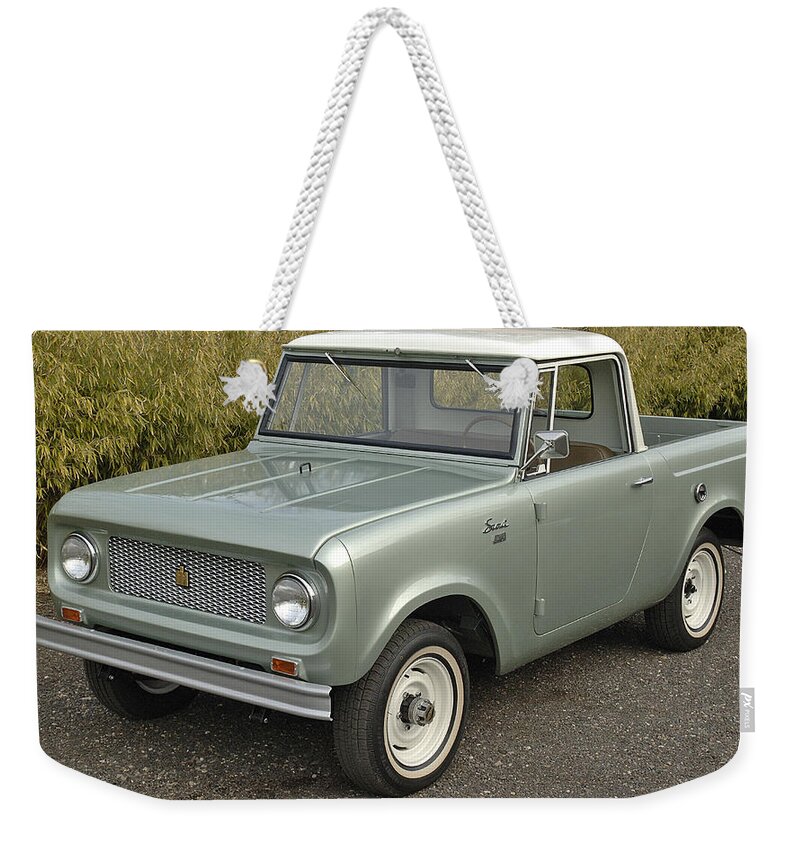 International Harvester Scout Weekender Tote Bag featuring the photograph International Harvester Scout #1 by Mariel Mcmeeking