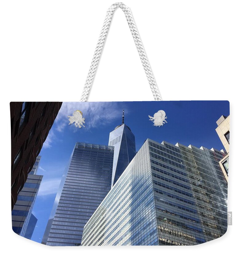 New York Weekender Tote Bag featuring the photograph Looking Up #1 by Val Oconnor