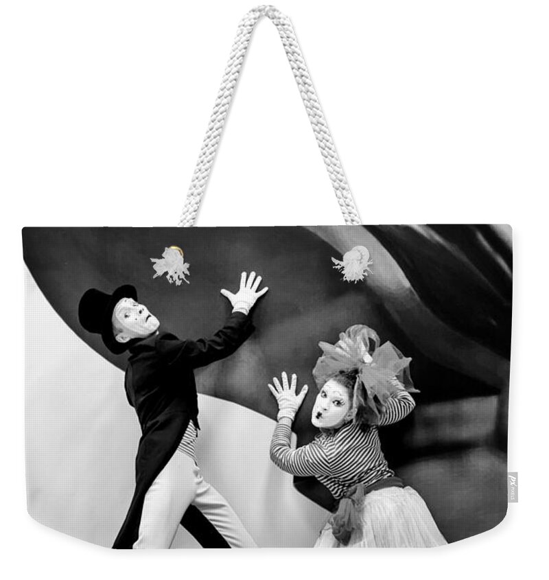Giant Weekender Tote Bag featuring the photograph Mime Artists Giant Hand Illusion Colour #1 by John Williams