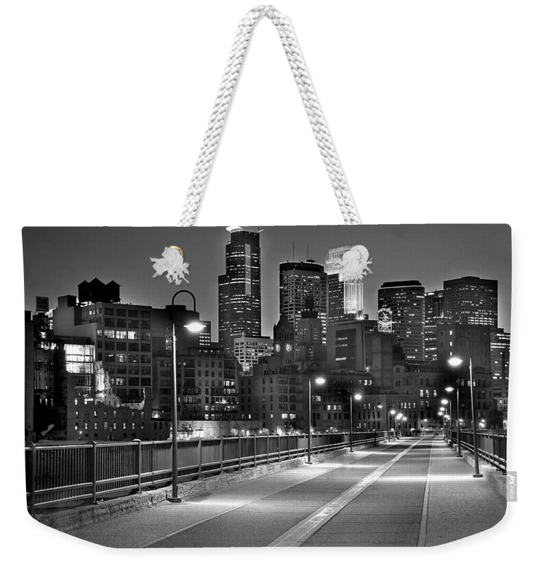 Minneapolis Skyline Weekender Tote Bag featuring the photograph Minneapolis Skyline from Stone Arch Bridge by Jon Holiday