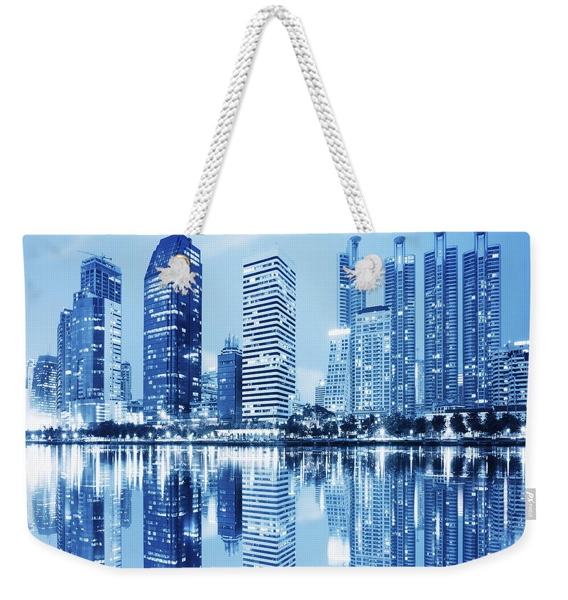 Architecture Weekender Tote Bag featuring the photograph Night Scenes Of City by Setsiri Silapasuwanchai