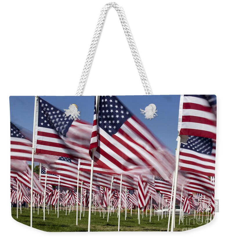 Flag Pole Weekender Tote Bag featuring the photograph Patriotic American Flag Display #1 by Anthony Totah