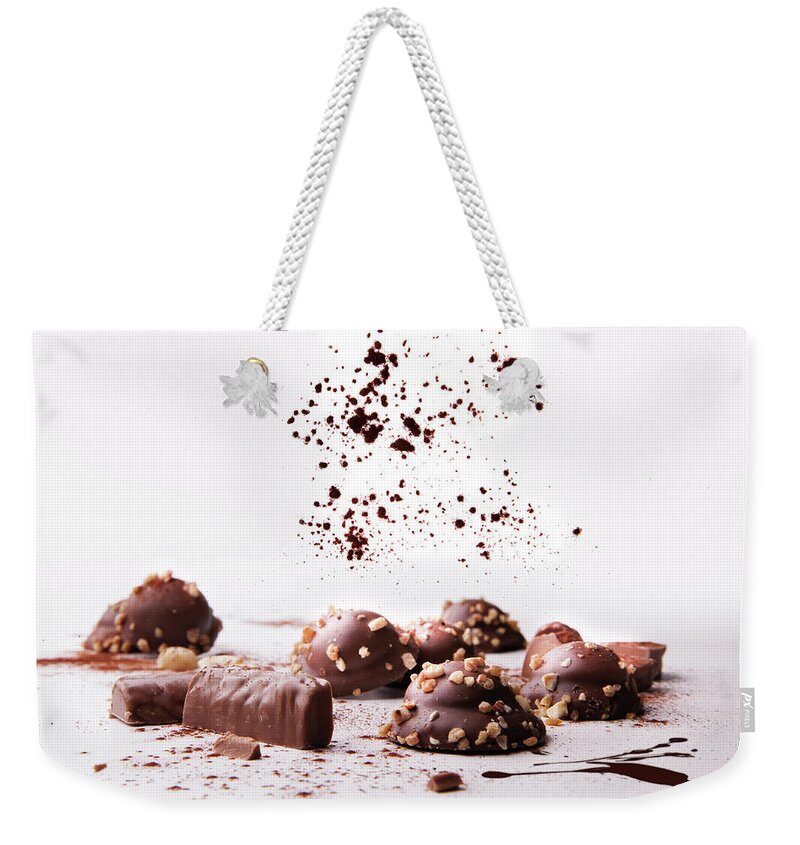 Swets Weekender Tote Bag featuring the photograph Pralines #1 by Christine Sponchia