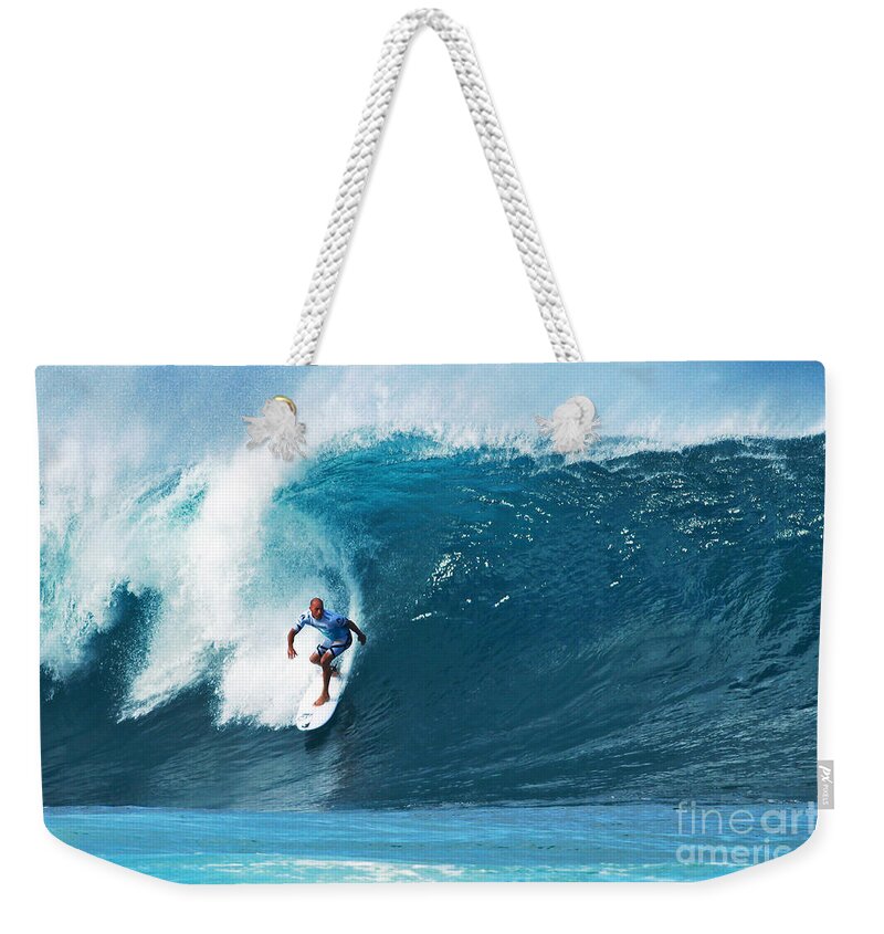 Kelly Slater Weekender Tote Bag featuring the photograph Pro Surfer Kelly Slater Surfing in the Pipeline Masters Contest #1 by Paul Topp
