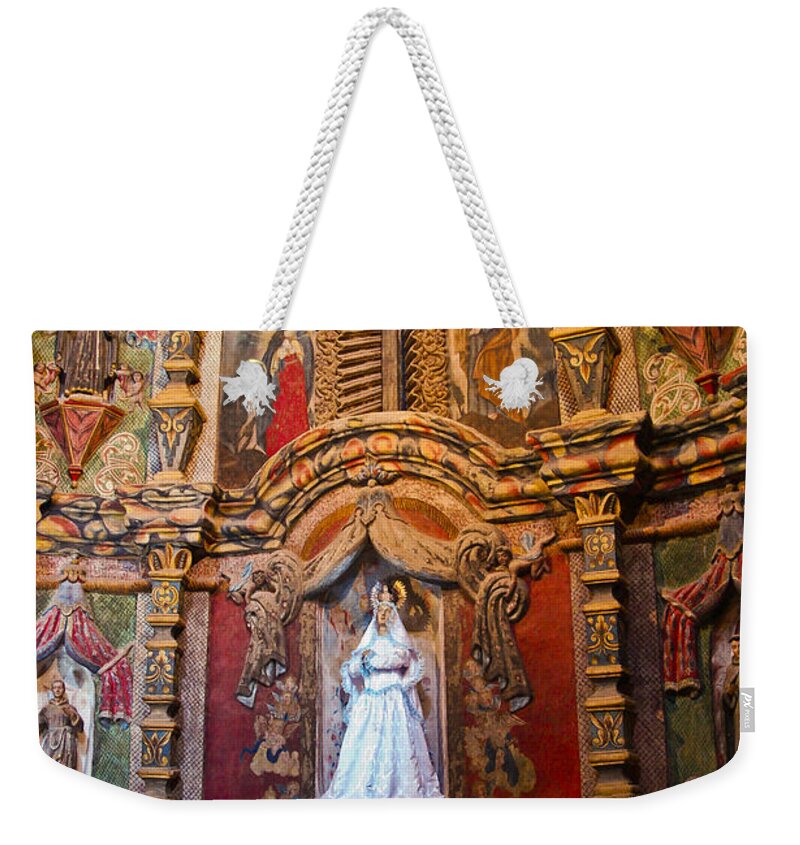 San Xavier De Bac Mission Weekender Tote Bag featuring the photograph San Xavier side altar #1 by Jon Berghoff
