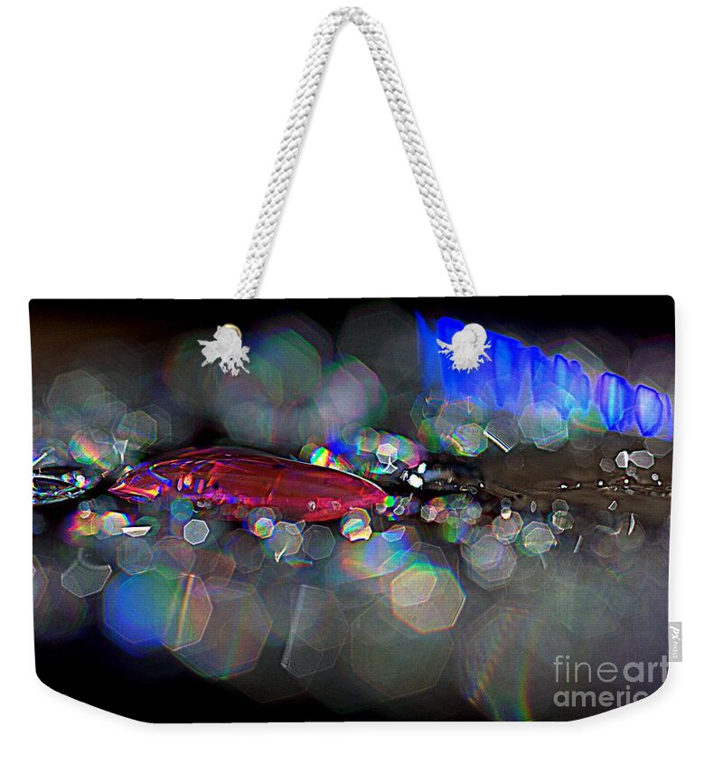  Weekender Tote Bag featuring the photograph Sparks #1 by Sylvie Leandre