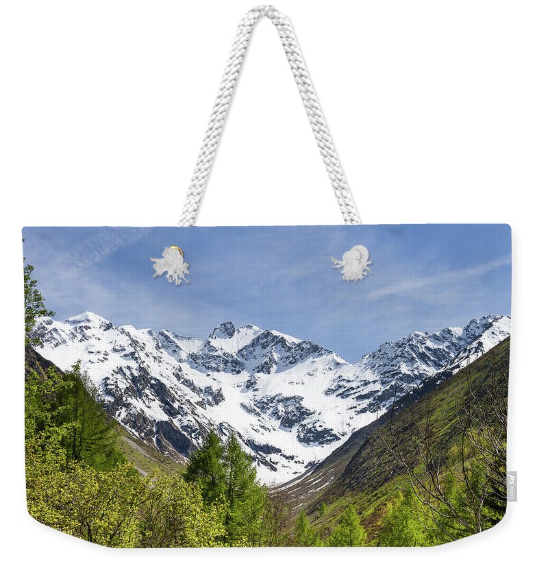 French Alps Weekender Tote Bag featuring the photograph Spring in French Alps by Paul MAURICE