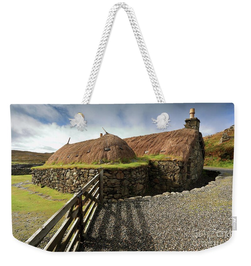Blackhouse Weekender Tote Bag featuring the photograph Thatched Blackhouse, Isle of Lewis by Maria Gaellman