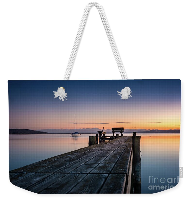 Ammersee Weekender Tote Bag featuring the photograph The jetty to sunset by Hannes Cmarits