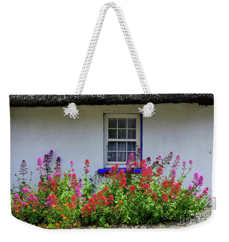 Thatch Weekender Tote Bag featuring the photograph The Old thatched home #1 by Joe Cashin