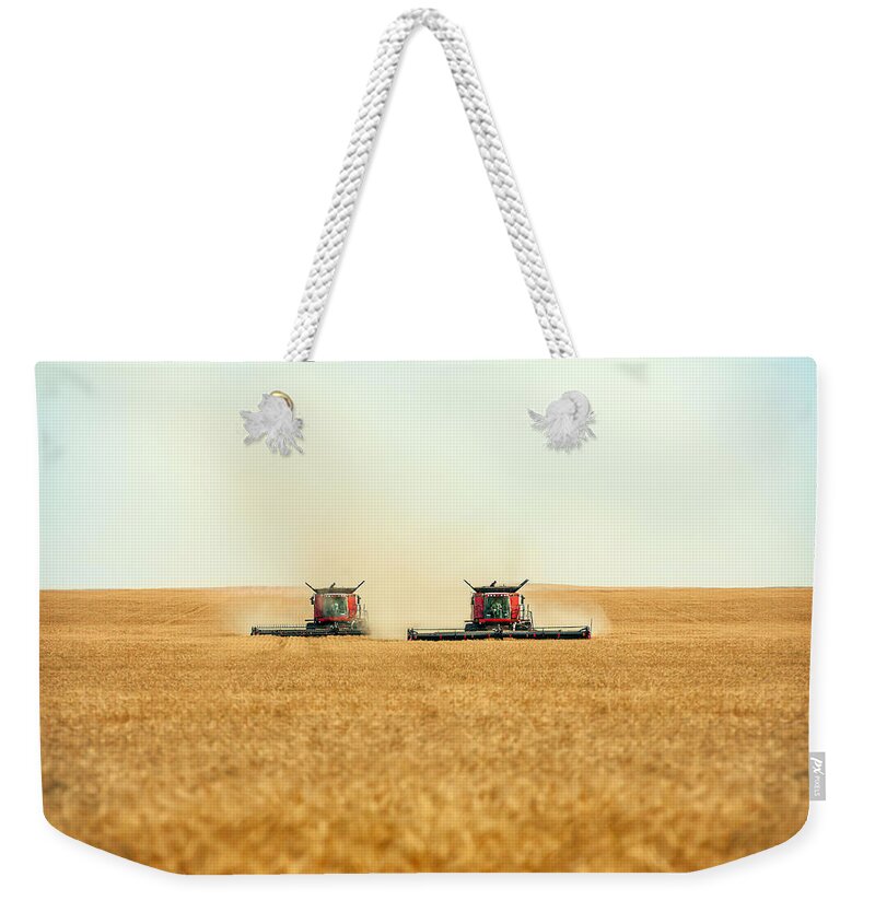 Combine Weekender Tote Bag featuring the photograph Twin Combines #1 by Todd Klassy