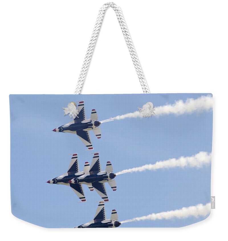 Usaf Thunderbirds Weekender Tote Bag featuring the photograph US Air Force Thunderbirds flying preforming precision aerial maneuvers #1 by Anthony Totah