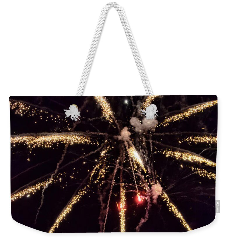 Black Weekender Tote Bag featuring the photograph A shining colorful firework #12 by Gina Koch