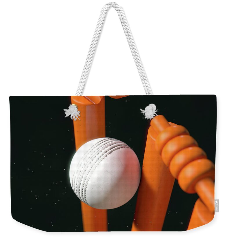 Action Weekender Tote Bag featuring the digital art Cricket Ball Hitting Wickets #15 by Allan Swart