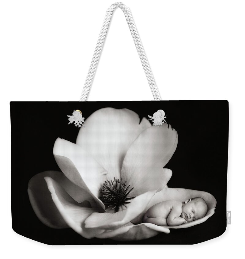 Black And White Weekender Tote Bag featuring the photograph Violet in a Magnolia by Anne Geddes
