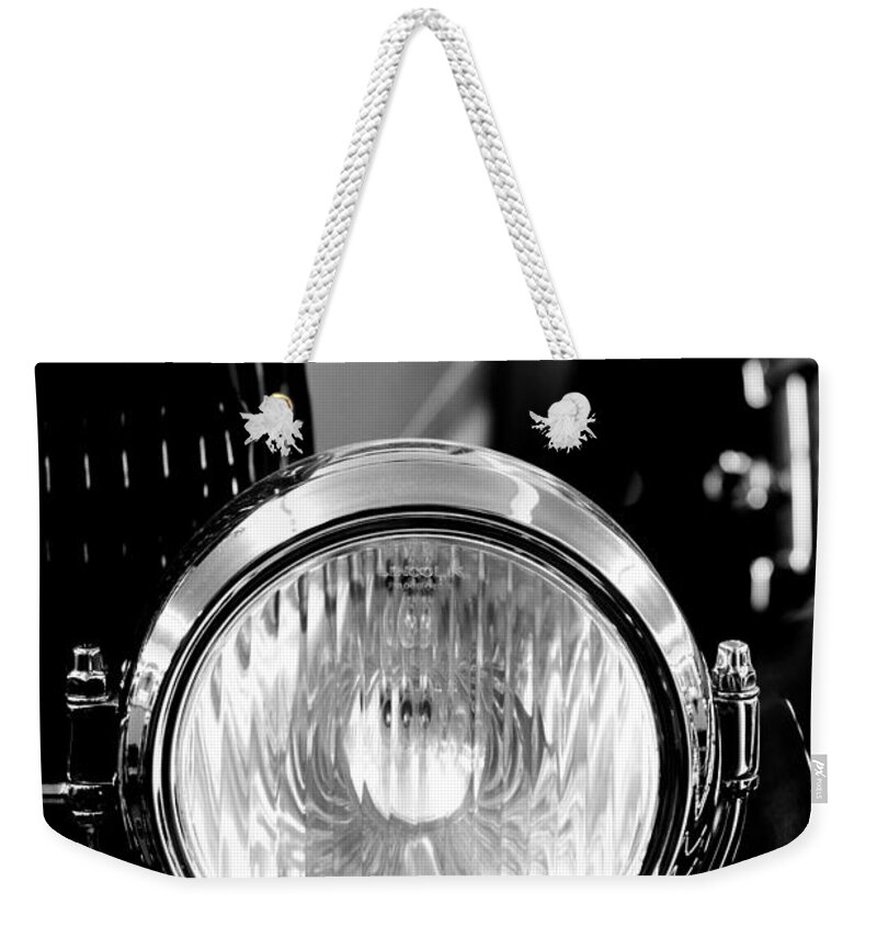 1925 Lincoln Weekender Tote Bag featuring the photograph 1925 Lincoln Town Car Headlight by Sebastian Musial