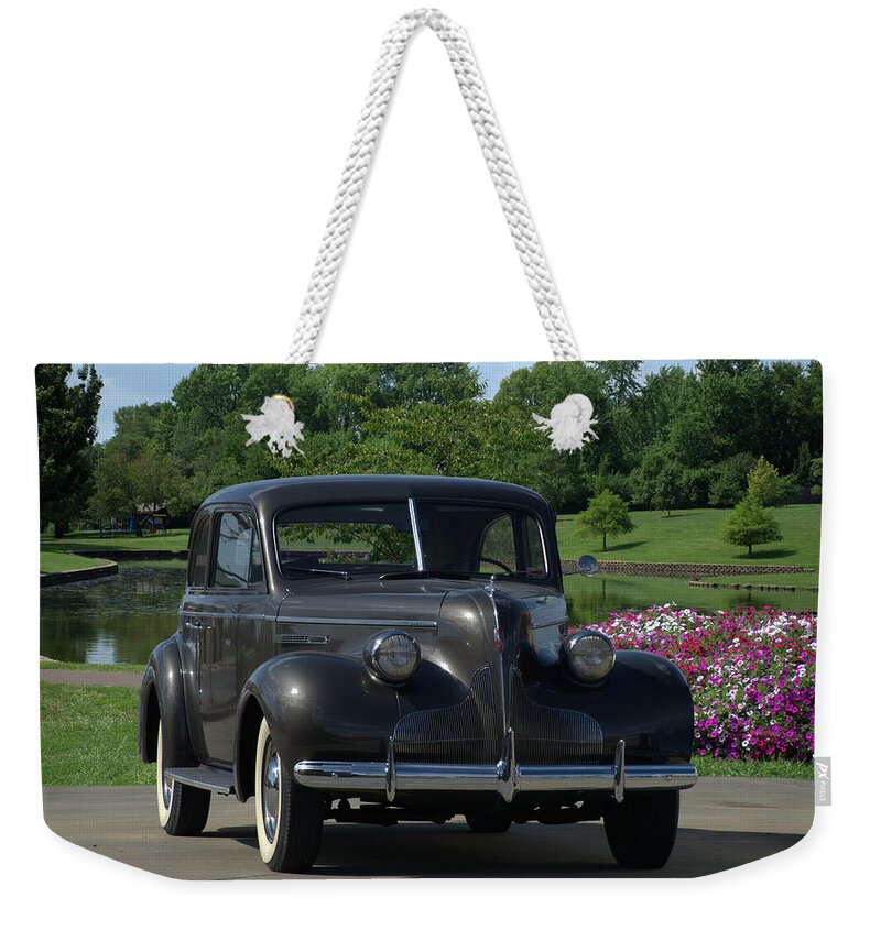 1939 Buick Weekender Tote Bag featuring the photograph 1939 Buick by Tim McCullough
