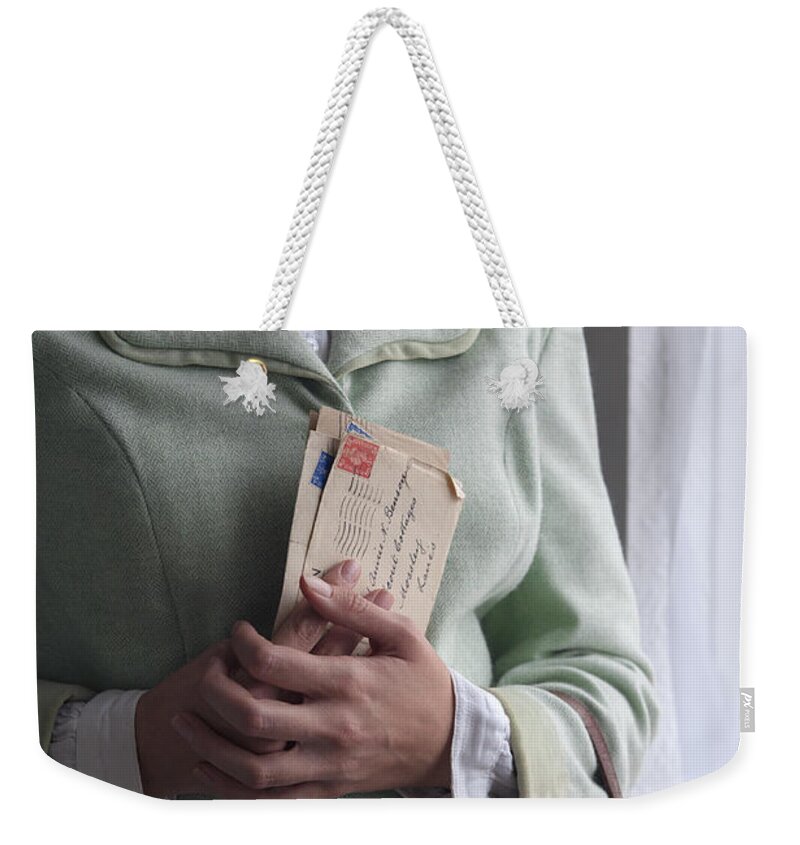 Woman Weekender Tote Bag featuring the photograph 1940s Woman At The Window With Vintage Letters by Lee Avison