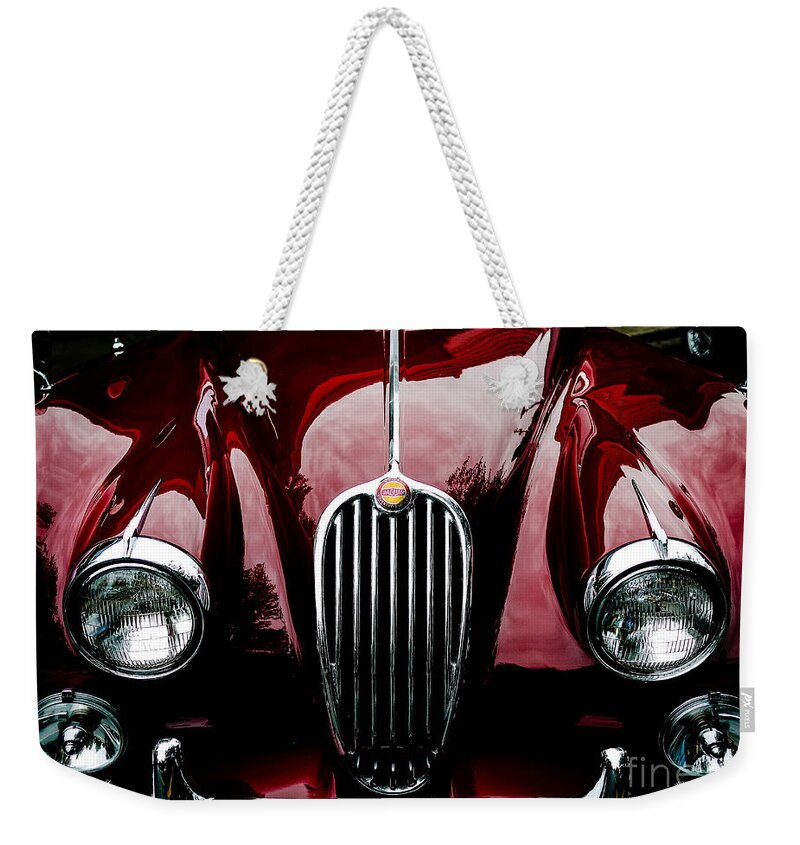 1955 Weekender Tote Bag featuring the photograph 1955 Jaguar Front Grill by M G Whittingham