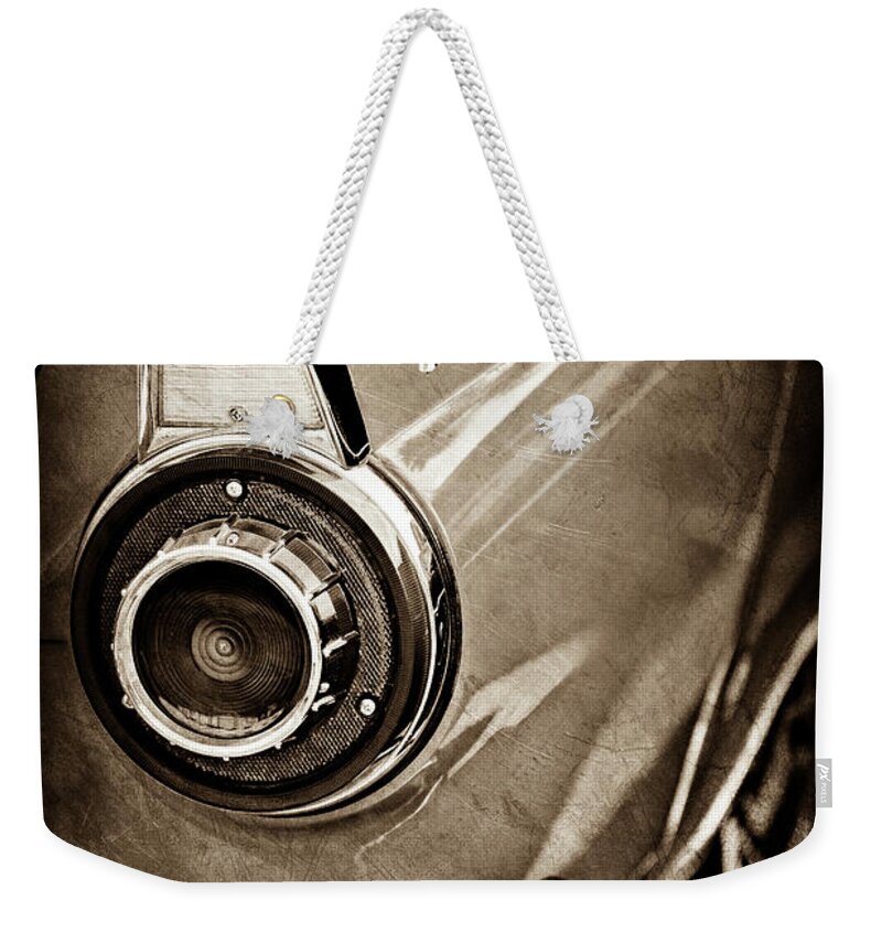1956 Ford Thunderbird Taillight Emblem Weekender Tote Bag featuring the photograph 1956 Ford Thunderbird Taillight Emblem -0382s by Jill Reger