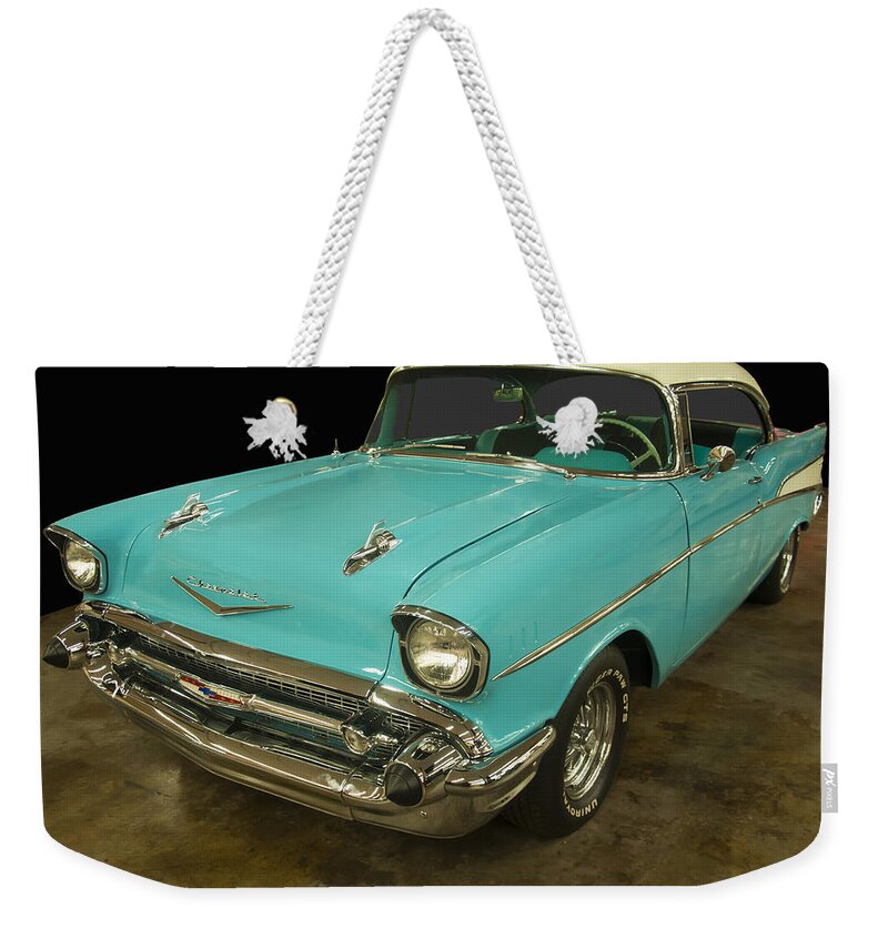 Chevrolet Weekender Tote Bag featuring the photograph 1957 Chevrolet 210 by Flees Photos