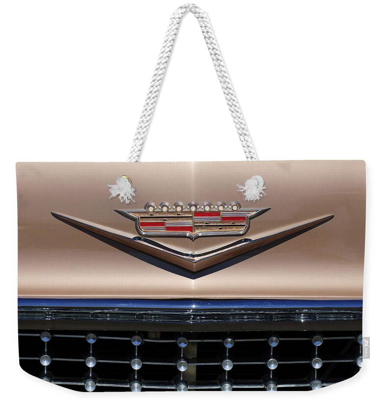 1958 Cadillac Eldorado Barritz Weekender Tote Bag featuring the photograph 1958 Cadillac Eldorado Barritz Emblem by Jill Reger