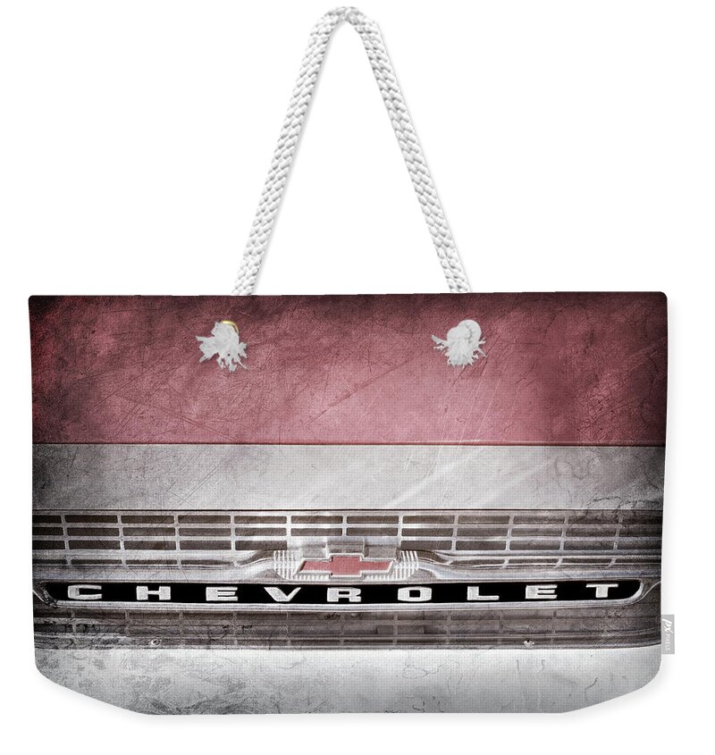 1961 Chevrolet Corvair Pickup Truck Grille Emblem Weekender Tote Bag featuring the photograph 1961 Chevrolet Corvair Pickup Truck Grille Emblem -0130ac by Jill Reger