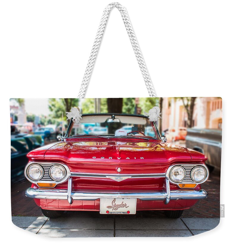 Corvair Weekender Tote Bag featuring the photograph 1964 Corvair Spyder by Lynne Jenkins
