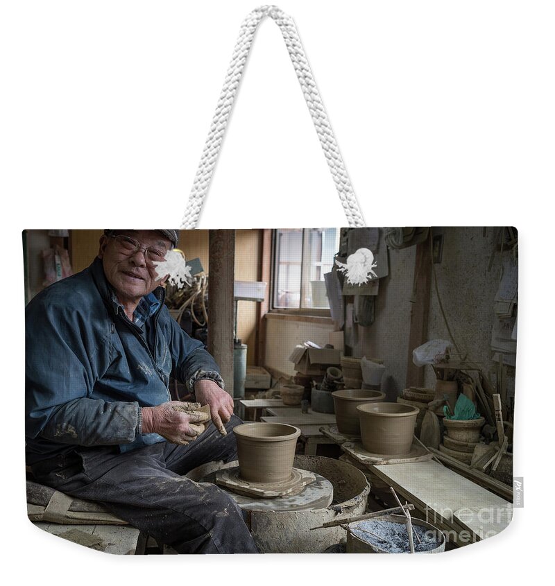 Pottery Weekender Tote Bag featuring the photograph A Village Pottery Studio, Japan by Perry Rodriguez