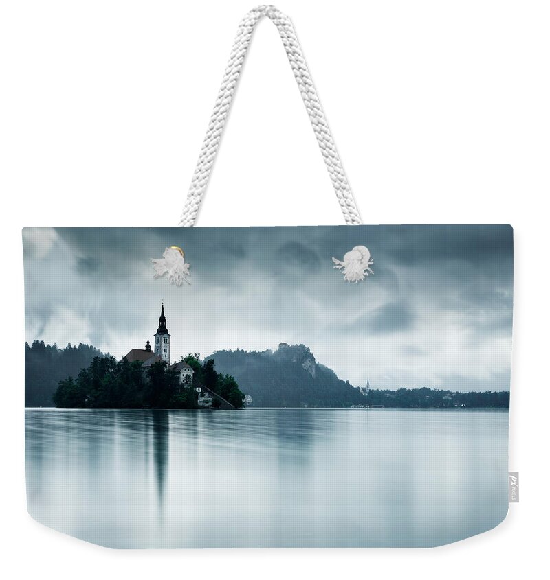 Bled Weekender Tote Bag featuring the photograph After the rain at Lake Bled #2 by Ian Middleton