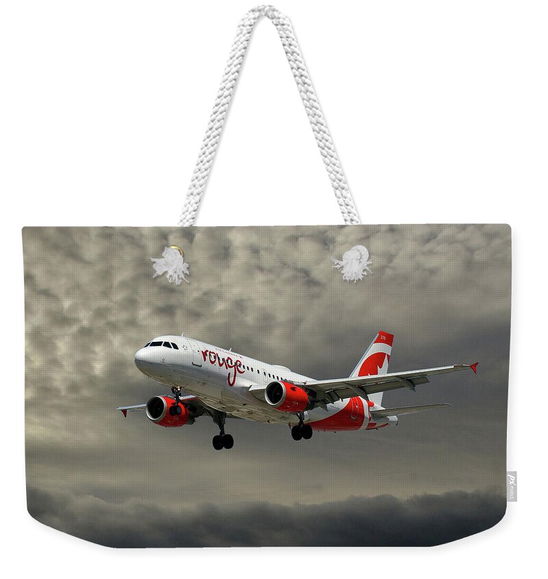 Air Canada Weekender Tote Bag featuring the photograph Air Canada Rouge Airbus A319 #2 by Smart Aviation