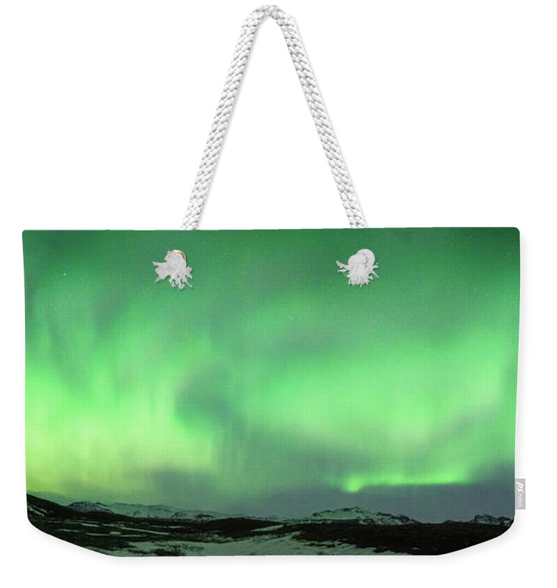 Iceland Weekender Tote Bag featuring the photograph Aurora Borealis or Northern Lights. #2 by Andy Astbury