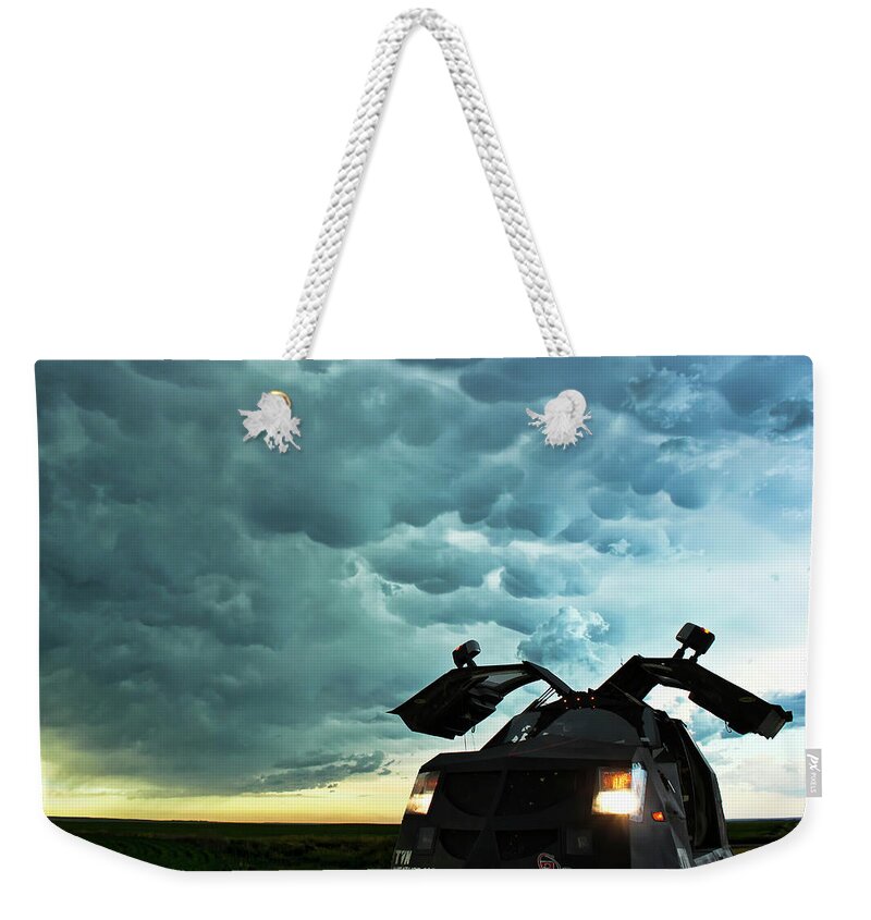 Clouds Weekender Tote Bag featuring the photograph Dominating the Storm by Ryan Crouse