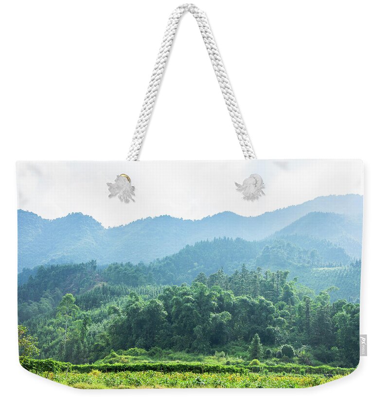 Scenery Weekender Tote Bag featuring the photograph Mountains and rural scenery #2 by Carl Ning