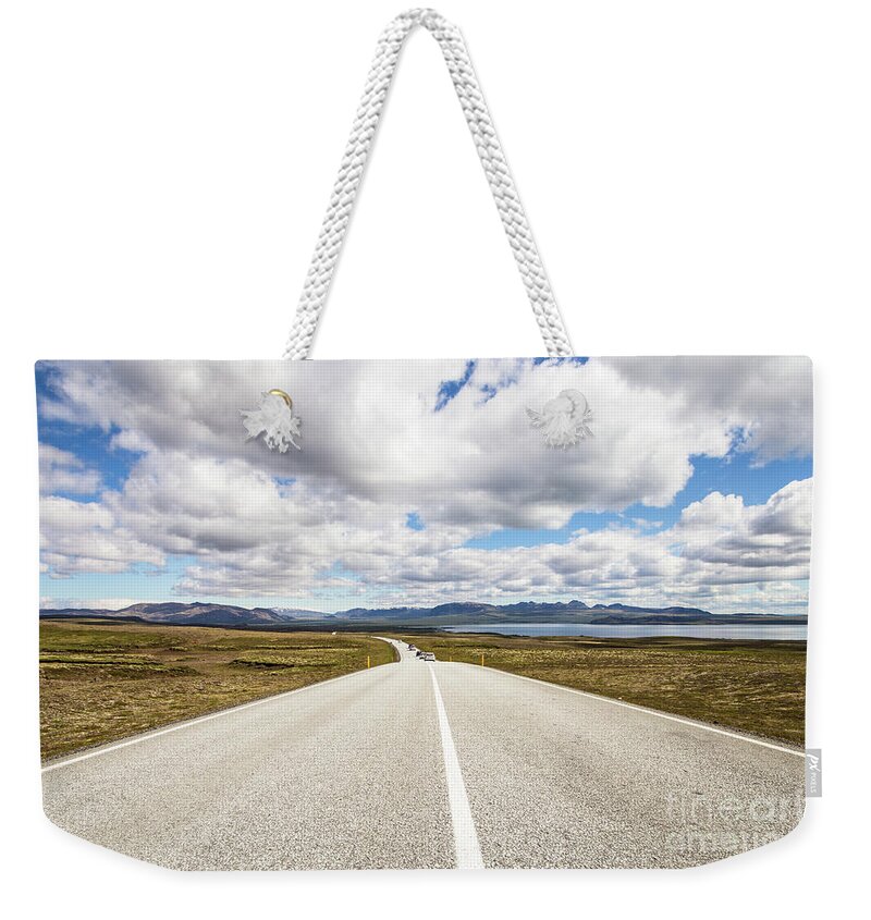 Iceland Weekender Tote Bag featuring the photograph On the road in Iceland #2 by Didier Marti