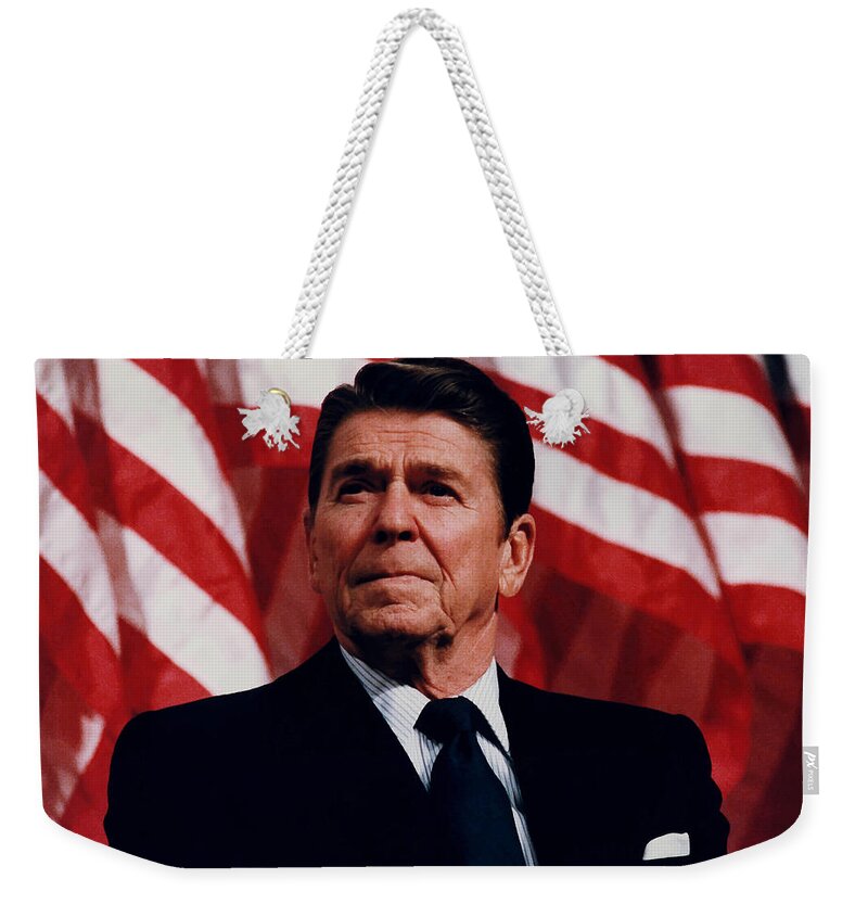 Ronald Reagan Weekender Tote Bag featuring the photograph President Ronald Reagan by War Is Hell Store
