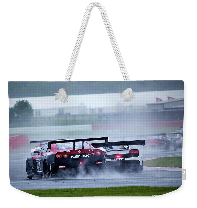 Racing Weekender Tote Bag featuring the digital art Racing #2 by Super Lovely