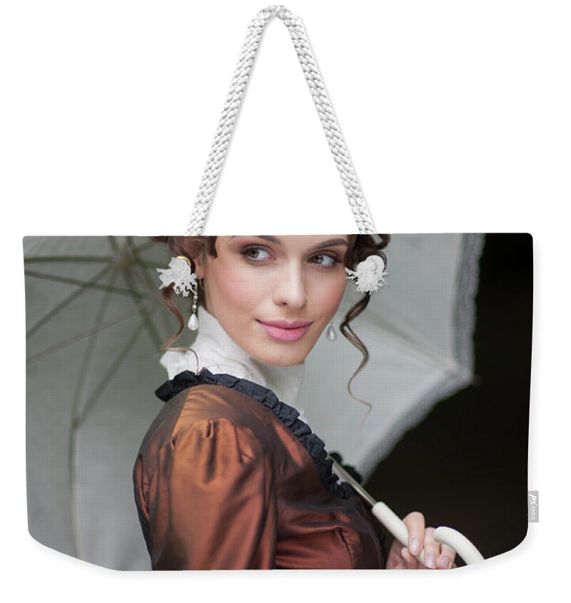 Victorian Weekender Tote Bag featuring the photograph Victorian Woman With Parasol #2 by Lee Avison