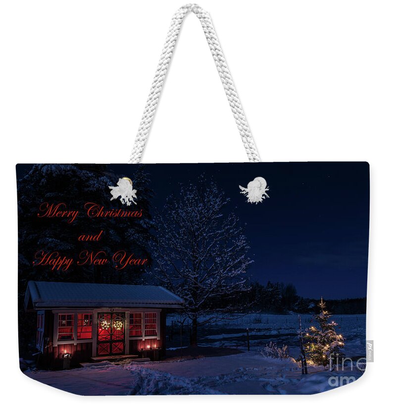Christmas Weekender Tote Bag featuring the photograph Winter night greetings in English by Torbjorn Swenelius
