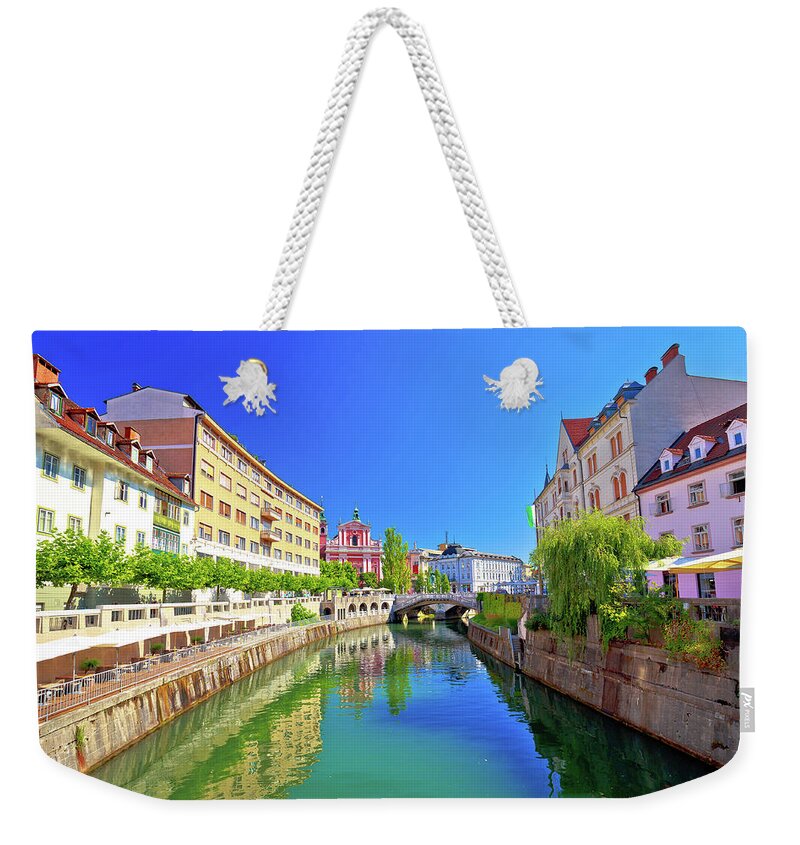 Capital Weekender Tote Bag featuring the photograph City of Ljubljana historic riverfont view #3 by Brch Photography