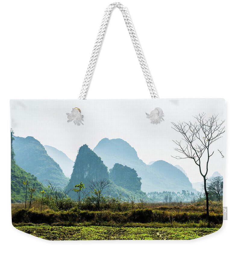 Countryside Weekender Tote Bag featuring the photograph Countryside scenery in the mist #3 by Carl Ning
