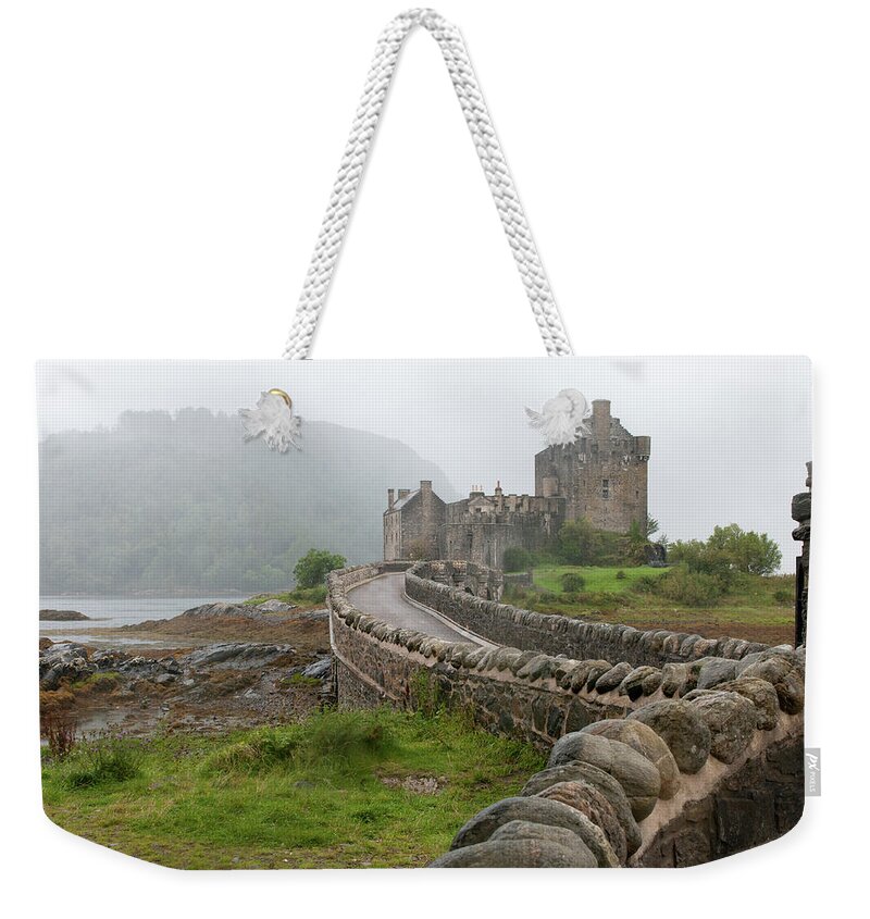 Landscape Weekender Tote Bag featuring the photograph Eilean Donan Castle by Michalakis Ppalis