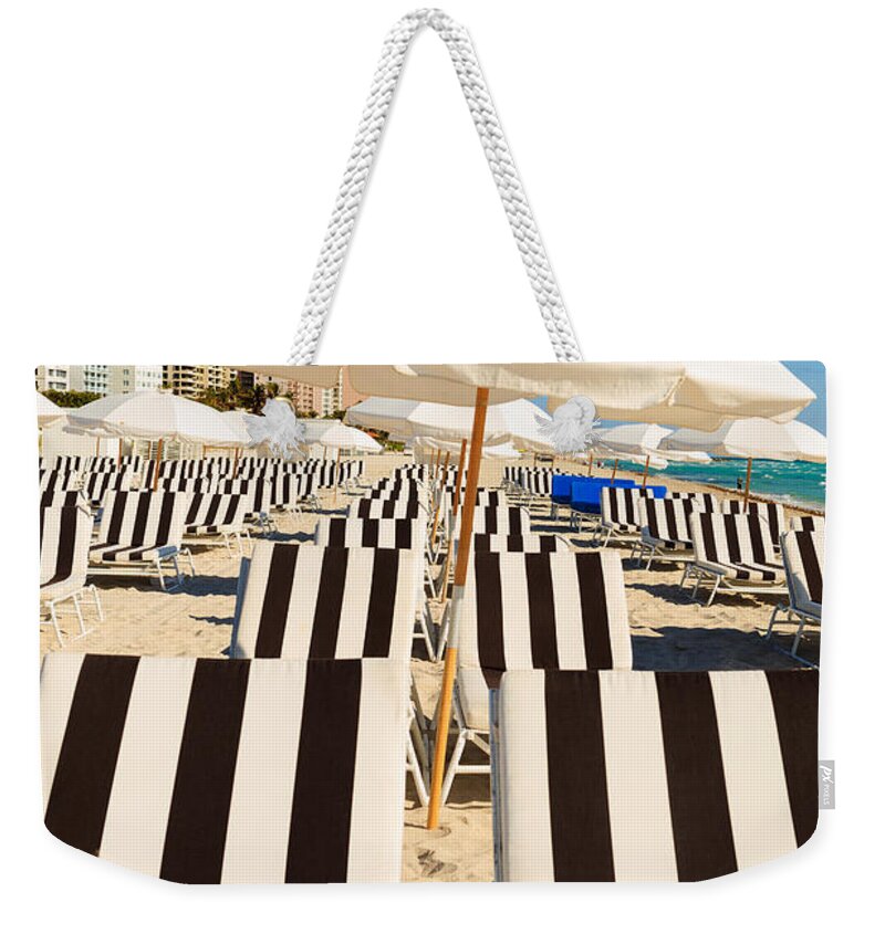 Chair Weekender Tote Bag featuring the photograph Miami Beach by Raul Rodriguez